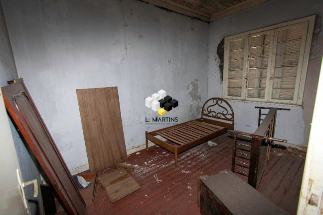 Imagem Casa com 5 Quartos à Venda, 144 m² em Independência - Porto Alegre