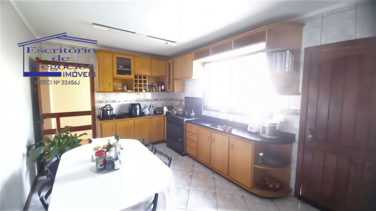 Imagem Casa com 4 Quartos à Venda, 260 m² em Vila Nova - Porto Alegre