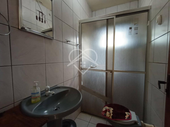 Imagem Casa com 5 Quartos à Venda, 220 m²