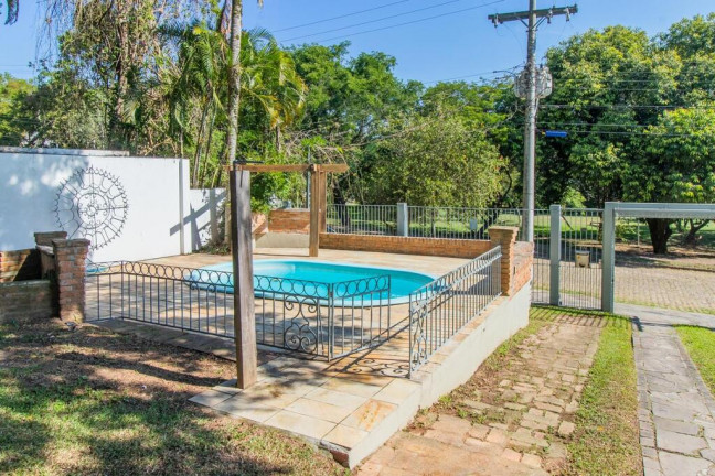 Imagem Casa com 4 Quartos à Venda, 348 m² em Ipanema - Porto Alegre