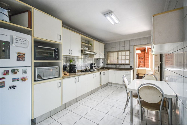 Imagem Casa com 4 Quartos à Venda, 144 m² em Campo Belo - São Paulo