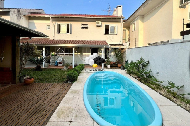 Imagem Casa com 4 Quartos à Venda, 243 m² em Moinhos De Vento - Canoas