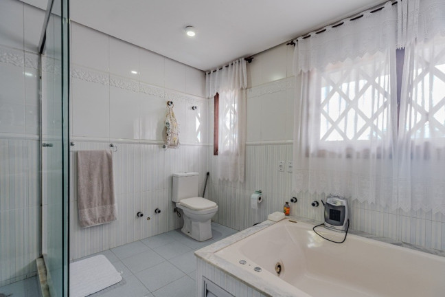 Imagem Casa de Condomínio com 3 Quartos à Venda, 385 m² em Agronomia - Porto Alegre