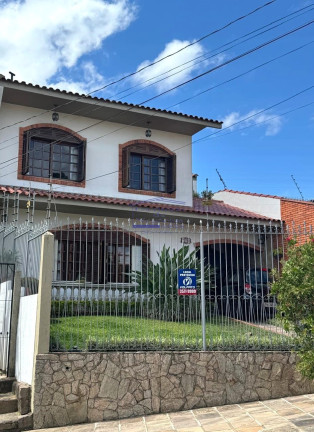Imagem Casa com 3 Quartos à Venda, 244 m² em Cavalhada - Porto Alegre Imagem Casa com 3 Quartos à Venda, 244 m² em Cavalhada - Porto Alegre