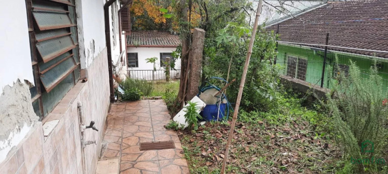 Imagem Casa com 3 Quartos à Venda, 300 m² em Vila Nova - Porto Alegre