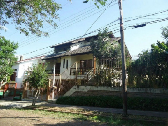 Imagem Casa com 3 Quartos à Venda, 226 m² em Parque Santa Fé - Porto Alegre Imagem Casa com 3 Quartos à Venda, 226 m² em Parque Santa Fé - Porto Alegre