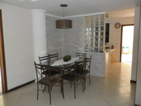 Imagem Casa com 4 Quartos à Venda, 256 m² em Santinho - Florianópolis