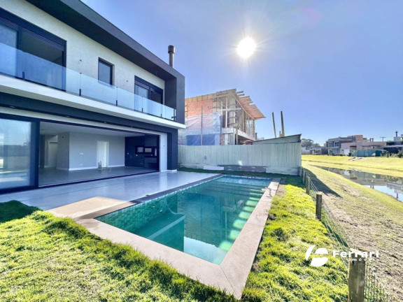 Imagem Casa de Condomínio com 4 Quartos à Venda, 336 m² em Parque Antártica - Capao Da Canoa