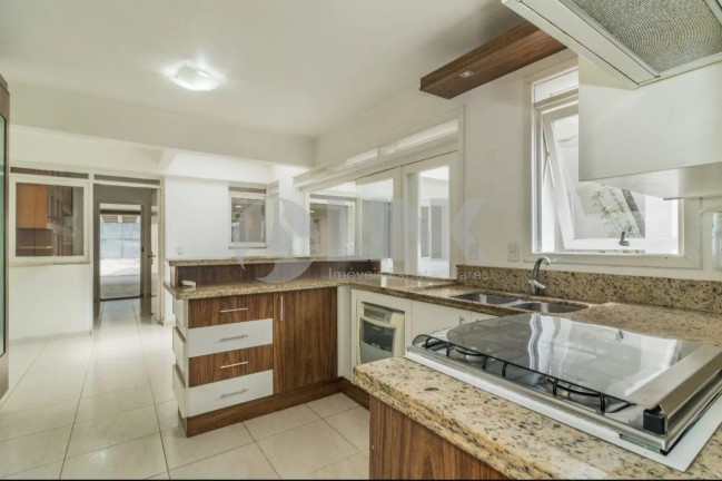 Imagem Casa com 4 Quartos à Venda, 250 m² em Menino Deus - Porto Alegre Imagem Casa com 4 Quartos à Venda, 250 m² em Menino Deus - Porto Alegre