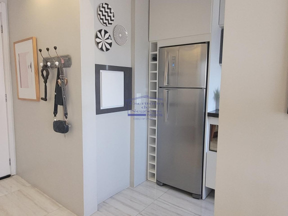 Imagem Imóvel com 2 Quartos à Venda, 56 m² em Cavalhada - Porto Alegre