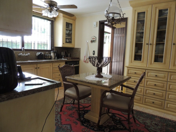 Imagem Casa com 4 Quartos à Venda, 430 m² em Vila Assunção - Porto Alegre