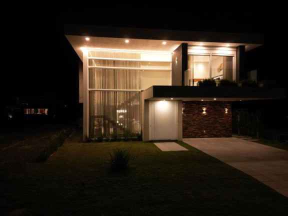 Imagem Casa com 4 Quartos à Venda, 348 m² em Capão Novo - Capao Da Canoa