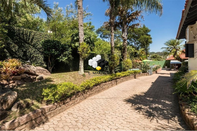 Imagem Casa com 4 Quartos à Venda, 525 m² em Jardim Sabará - Porto Alegre Imagem Casa com 4 Quartos à Venda, 525 m² em Jardim Sabará - Porto Alegre