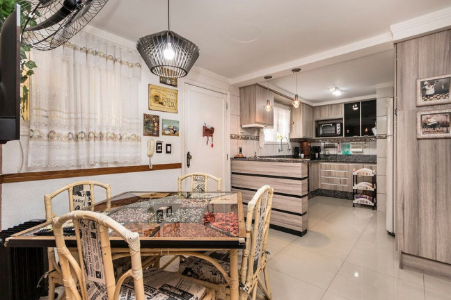 Imagem Casa com 5 Quartos à Venda, 381 m² em Jardim Lindóia - Porto Alegre