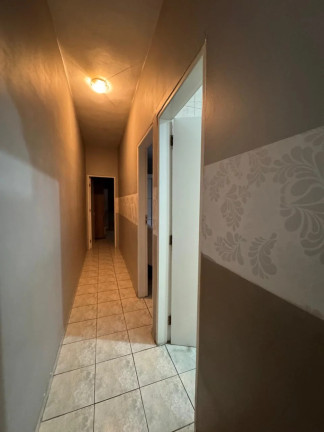 Imagem Casa com 2 Quartos à Venda, 96 m² em Guilhermina - Praia Grande