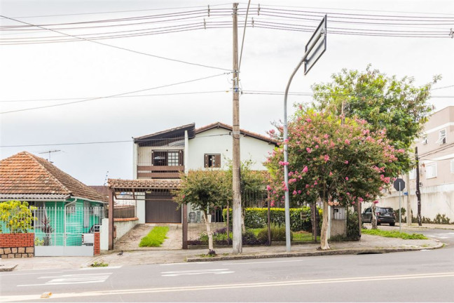 Imagem Casa com 4 Quartos à Venda, 313 m² em Cavalhada - Porto Alegre