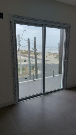 Imagem Sobrado com 4 Quartos à Venda, 199 m² em Araçá - Capao Da Canoa