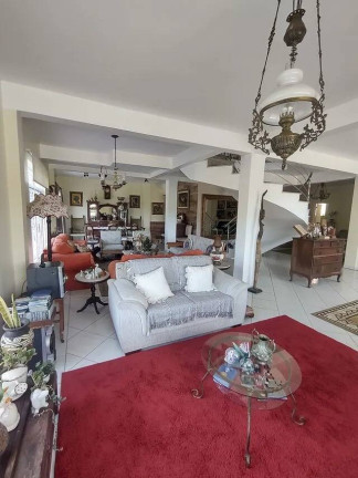 Imagem Casa com 4 Quartos à Venda, 329 m² em Vila Nova - Porto Alegre