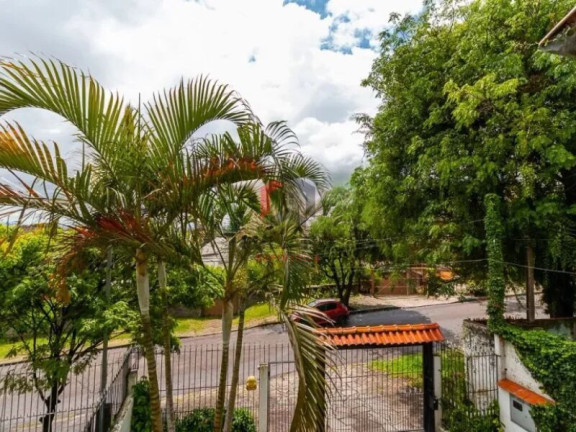 Imagem Casa com 4 Quartos à Venda, 280 m² em Vila Jardim - Porto Alegre