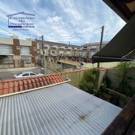 Imagem Casa com 3 Quartos à Venda, 192 m² em Vila Nova - Porto Alegre