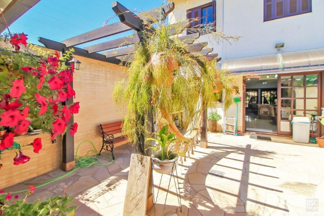 Imagem Casa com 3 Quartos à Venda, 198 m² em Cavalhada - Porto Alegre