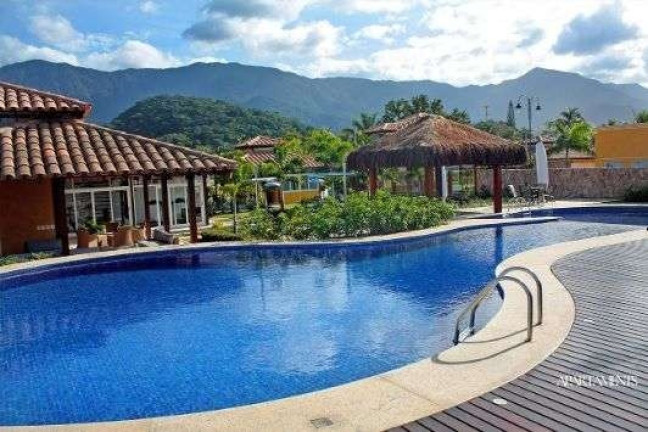 Casa de Condomínio com 4 Quartos à Venda, 360 m² em Massaguaçu - Caraguatatuba