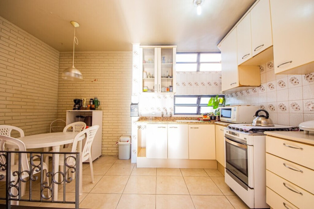 Imagem Casa com 3 Quartos à Venda, 122 m² em Cristo Redentor - Porto Alegre Imagem Casa com 3 Quartos à Venda, 122 m² em Cristo Redentor - Porto Alegre