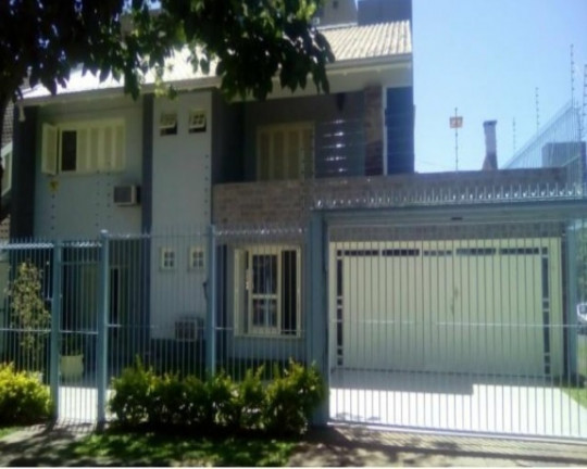 Imagem Casa com 4 Quartos à Venda, 330 m² em Jardim Itu Sabará - Porto Alegre Imagem Casa com 4 Quartos à Venda, 330 m² em Jardim Itu Sabará - Porto Alegre