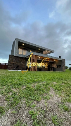 Imagem Casa de Condomínio com 4 Quartos à Venda, 390 m² em Capao Novo Posto 9 Village - Capão Da Canoa Imagem Casa de Condomínio com 4 Quartos à Venda, 390 m² em Capao Novo Posto 9 Village - Capão Da Canoa
