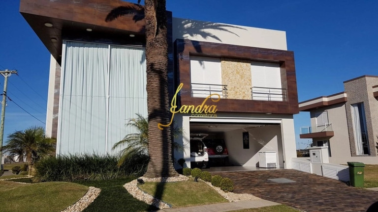 Imagem Casa de Condomínio com 5 Quartos à Venda, 611 m² em Capão Ilhas Resort - Capão Da Canoa Imagem Casa de Condomínio com 5 Quartos à Venda, 611 m² em Capão Ilhas Resort - Capão Da Canoa