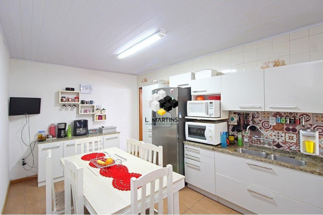 Imagem Casa com 2 Quartos à Venda, 101 m² em Vila Nova - Porto Alegre