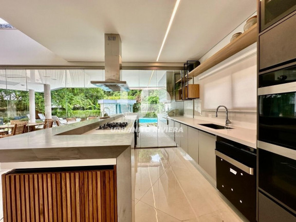 Imagem Casa com 7 Quartos à Venda, 731 m² em Riviera | Módulo 21 - Bertioga