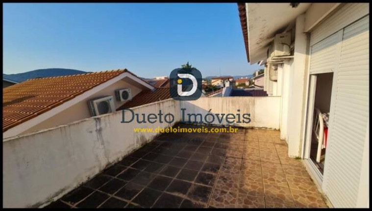 Imagem Casa com 4 Quartos à Venda, 284 m² em Camobi - Santa Maria