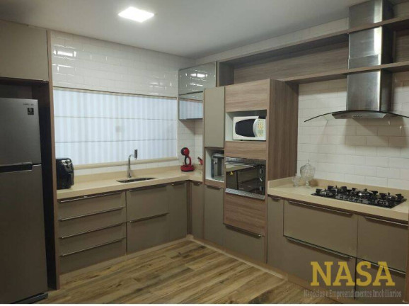 Imagem Casa com 4 Quartos à Venda, 390 m² em Condomínio Belvedere - Cuiabá
