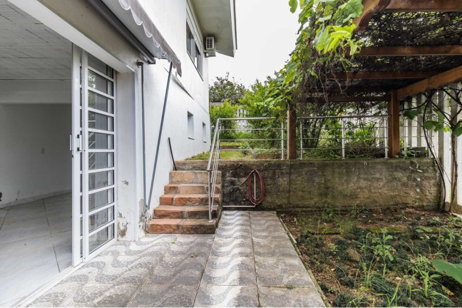 Imagem Casa de Condomínio com 3 Quartos à Venda, 213 m² em Mário Quintana - Porto Alegre