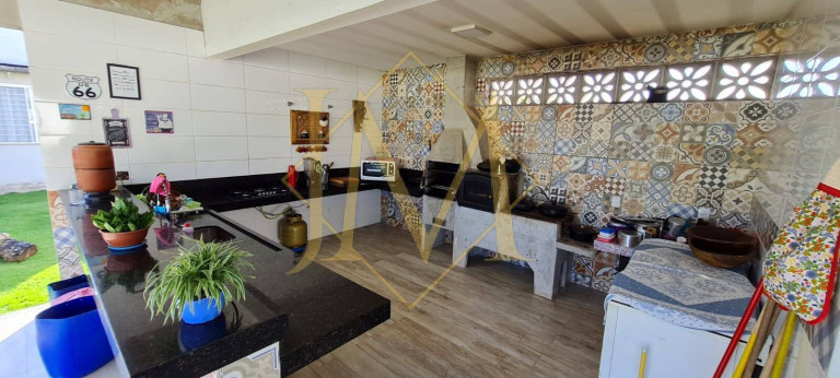 Imagem Chácara com 4 Quartos à Venda, 1.500 m² em Caratinga
