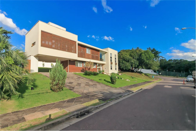 Imagem Casa com 4 Quartos à Venda, em Vila Nova - Porto Alegre Imagem Casa com 4 Quartos à Venda, em Vila Nova - Porto Alegre