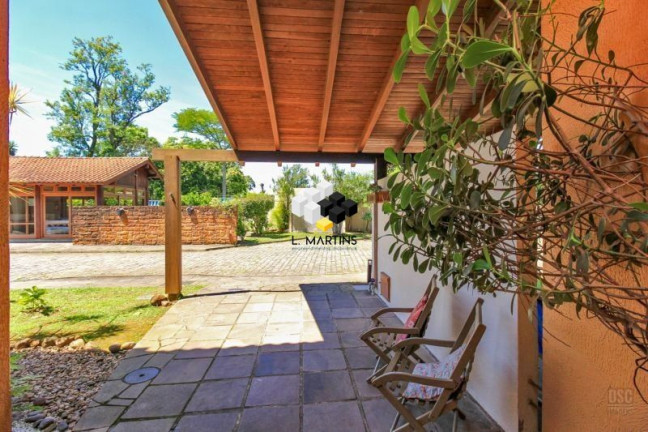 Imagem Casa com 4 Quartos à Venda, 117 m² em Cavalhada - Porto Alegre