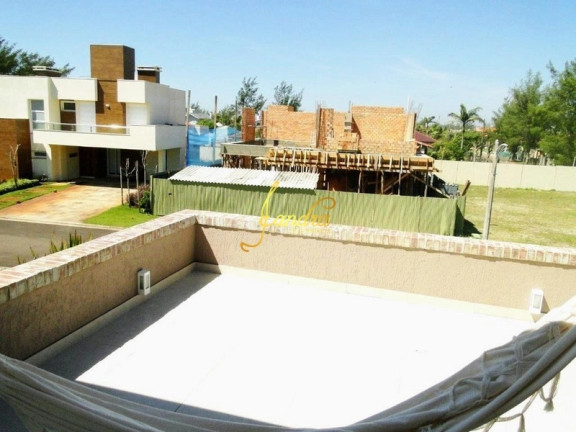 Imagem Casa de Condomínio com 4 Quartos à Venda, 389 m² em Remanso - Xangri-la