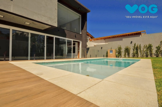Imagem Casa com 4 Quartos à Venda, 290 m² em Vila Nova - Porto Alegre Imagem Casa com 4 Quartos à Venda, 290 m² em Vila Nova - Porto Alegre