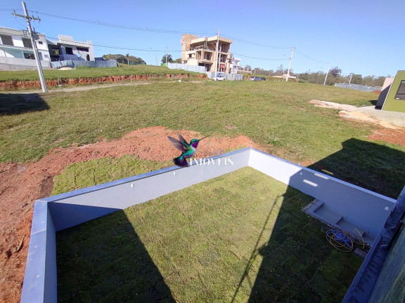 Imagem Casa de Condomínio com 3 Quartos à Venda, 233 m² em Coronel Nassuca - Guaíba