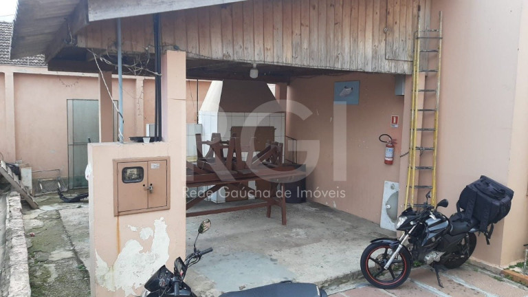 Imagem Casa de Condomínio com 1 Quarto à Venda, 61 m² em Vila São José - Porto Alegre