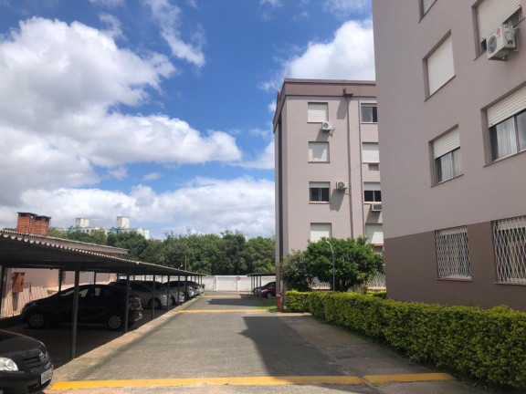 Imagem Apartamento com 2 Quartos à Venda, 63 m² em Protasio - Porto Alegre