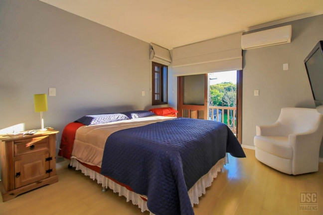 Imagem Casa de Condomínio com 3 Quartos à Venda, 266 m² em Ipanema - Porto Alegre