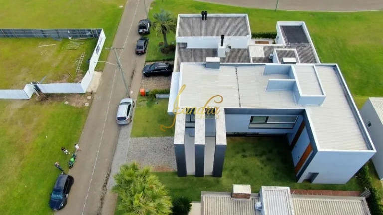 Imagem Casa de Condomínio com 5 Quartos à Venda, 310 m² em Zona Nova - Capão Da Canoa
