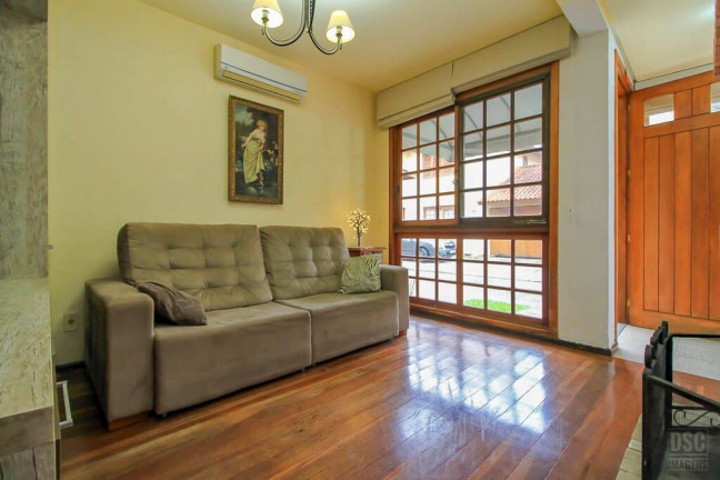 Imagem Casa de Condomínio com 3 Quartos à Venda, 151 m² em Ipanema - Porto Alegre