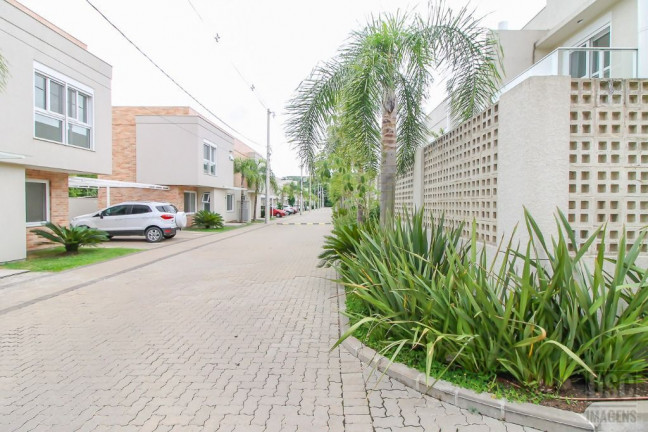 Imagem Casa de Condomínio com 3 Quartos à Venda, 155 m² em Vila Nova - Porto Alegre