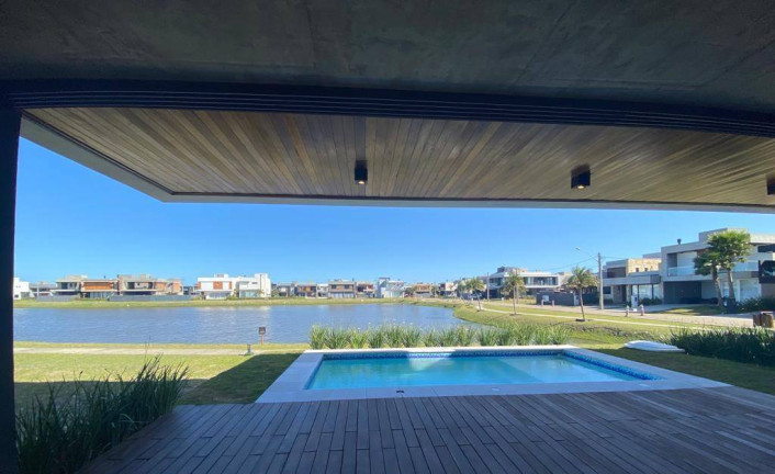 Imagem Casa de Condomínio com 4 Quartos à Venda, 240 m² em Marina - Xangri-lá Imagem Casa de Condomínio com 4 Quartos à Venda, 240 m² em Marina - Xangri-lá