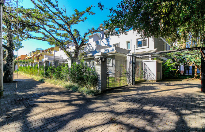 Imagem Casa de Condomínio com 3 Quartos à Venda, 241 m² em Tristeza - Porto Alegre