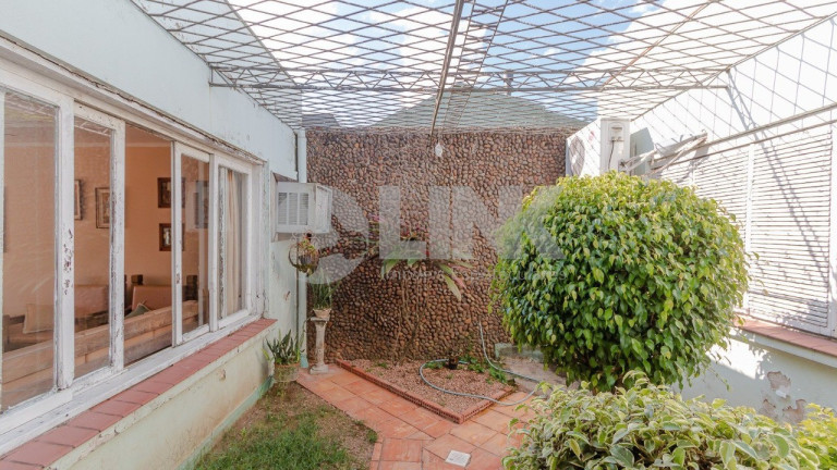 Imagem Casa com 4 Quartos à Venda, 254 m² em Chácara Das Pedras - Porto Alegre